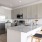 kitchen with bar stools and stainless steel appliances