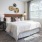 bedroom with a large bed and window